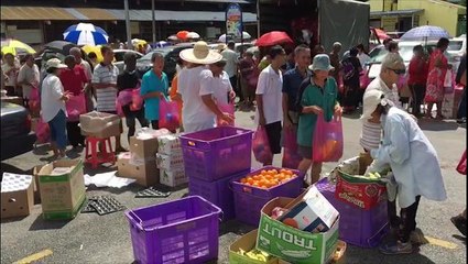 Elderly and disabled receive foodstuff from Penang philanthropist