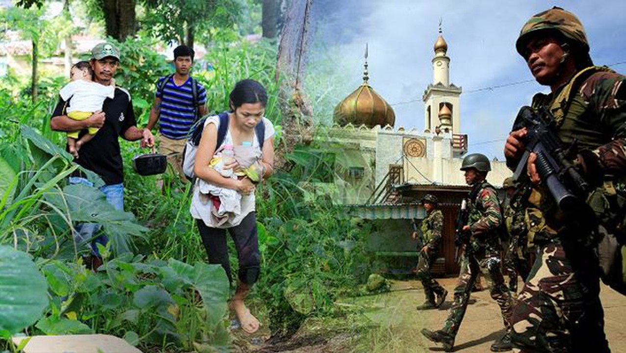 Residents flee Filipino city as fight against militants rages on