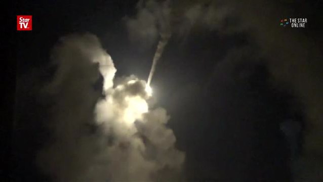 U.S. warships fire 59 missiles on Syrian airfield