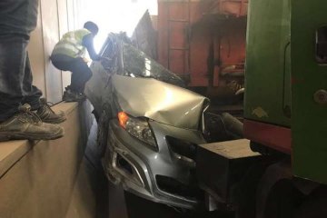 Car crushed by trailer in Singapore underpass