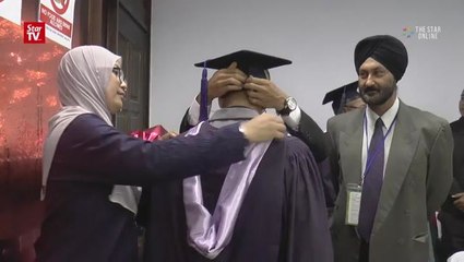 Prison bars no barrier for duo to graduate with MBAs