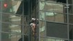 Climber caught after Trump Tower drama