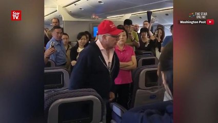 United Airlines flight removes man with Donald Trump cap