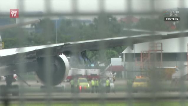 Singapore Airlines plane catches fire in emergency landing