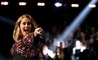 Adele rules Grammys despite slip up