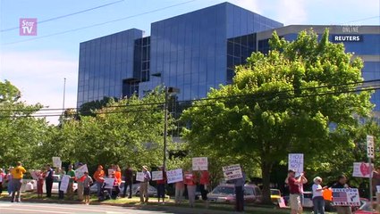 Protesters rally outside NRA headquarters