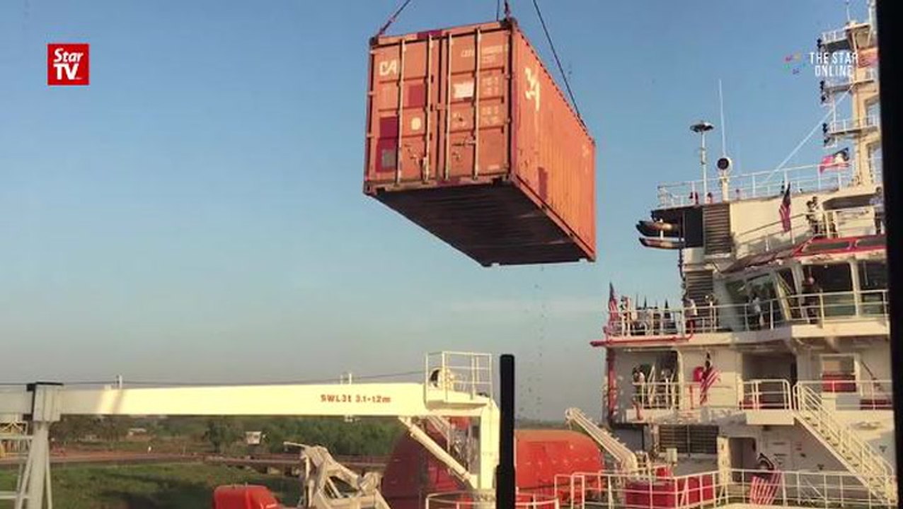 Rohingya aid offloads at Yangon