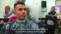 Palestinian barber ups the heat in male hair grooming