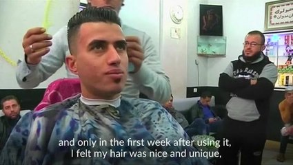 Palestinian barber ups the heat in male hair grooming
