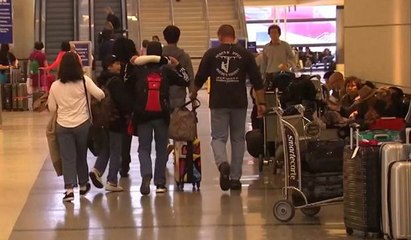 Travellers say they can't live in fear and will fly after London attack