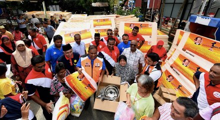 Penang floods: Relief aid convoy rolls into Penang