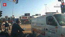 Ambulance struck by car, rams into motorcyclists