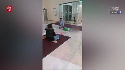 Toddlers fall to their death in China mall