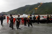 Bodies from a missing Myanmar army plane brought to shore