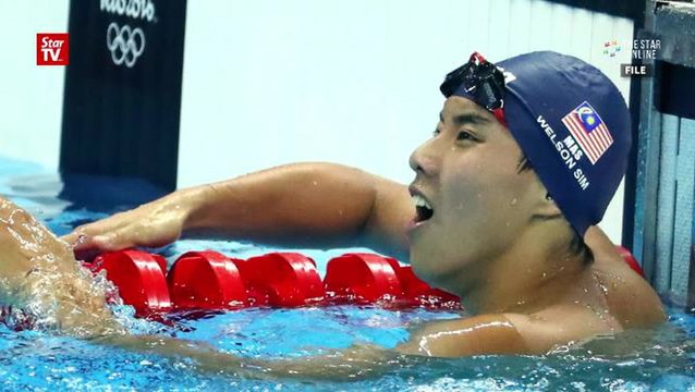 Sweet gold win for swimmer Welson Sim