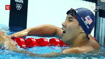 Sweet gold win for swimmer Welson Sim