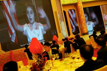 As Trump visits China, his granddaughter charms with Mandarin song