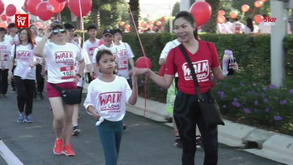 Early morning stroll for 2,000 participants at “Walk With Love”