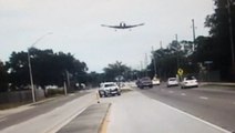 Small plane makes emergency crash landing on busy road