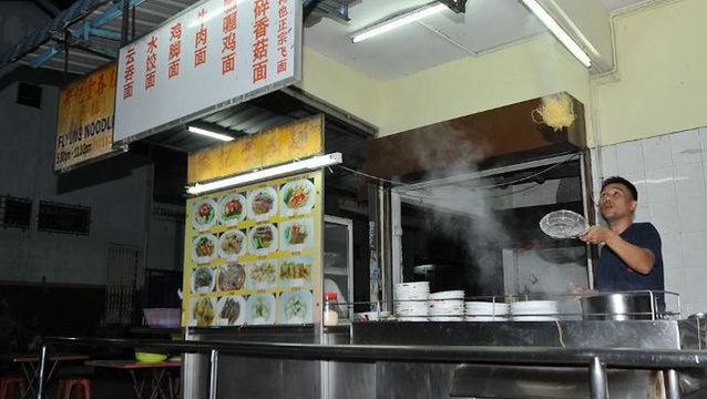 This food stall serves “flying noodles”