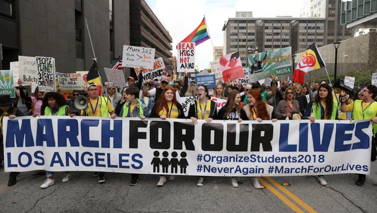 Huge rallies led by students demand tighter US gun controls