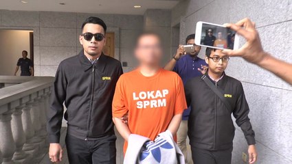 Court extends remand of ex-aide to Najib over school solar panel scandal