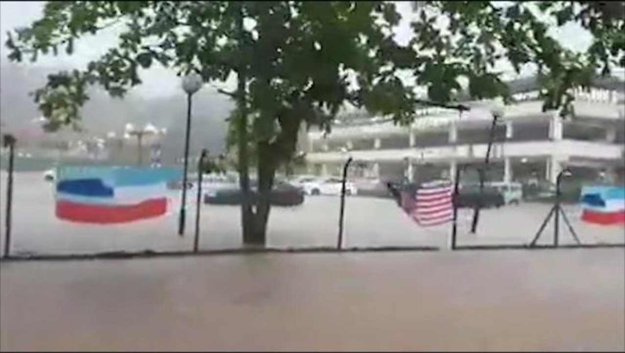 Heavy downpour and high tide causing flash floods in KK