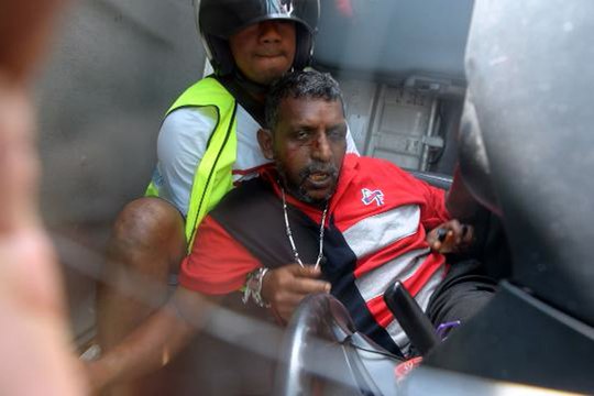 Trapped trucker rescued from overturned vehicle