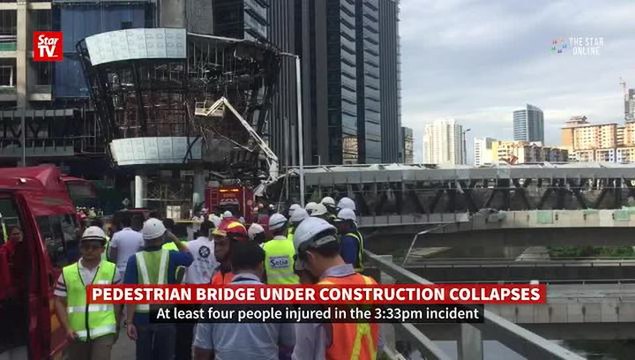 Pedestrian bridge collapses, injured four