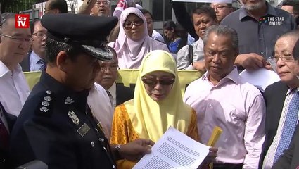 MPs march to Bukit Aman demanding Maria Chin's release