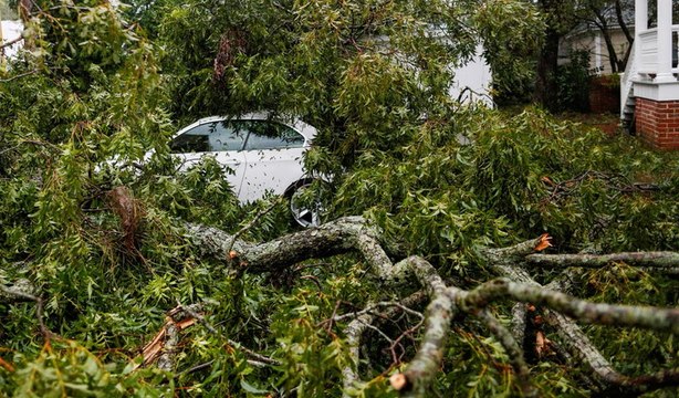 Florence downgraded as death toll climbs