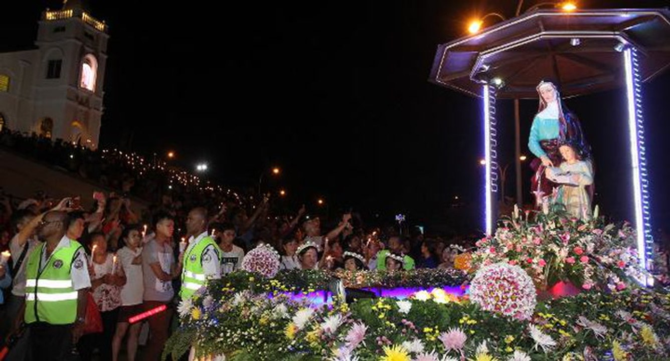Thousands attend St Anne's candlelight procession