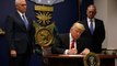 Trump signs order limiting refugees