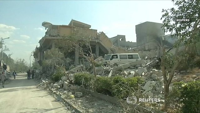 British PM defends air strikes in Syria against parliament critics