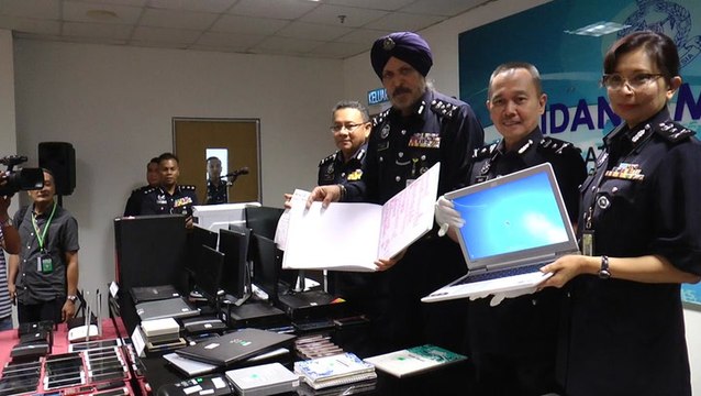Malaysia, China cops cripple scam syndicate, 140 nabbed