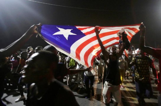 Ex-football star wins Liberian presidential election