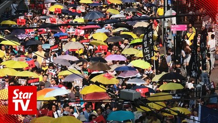 Download Video: Thousands take to Hong Kong streets to protest new extradition laws