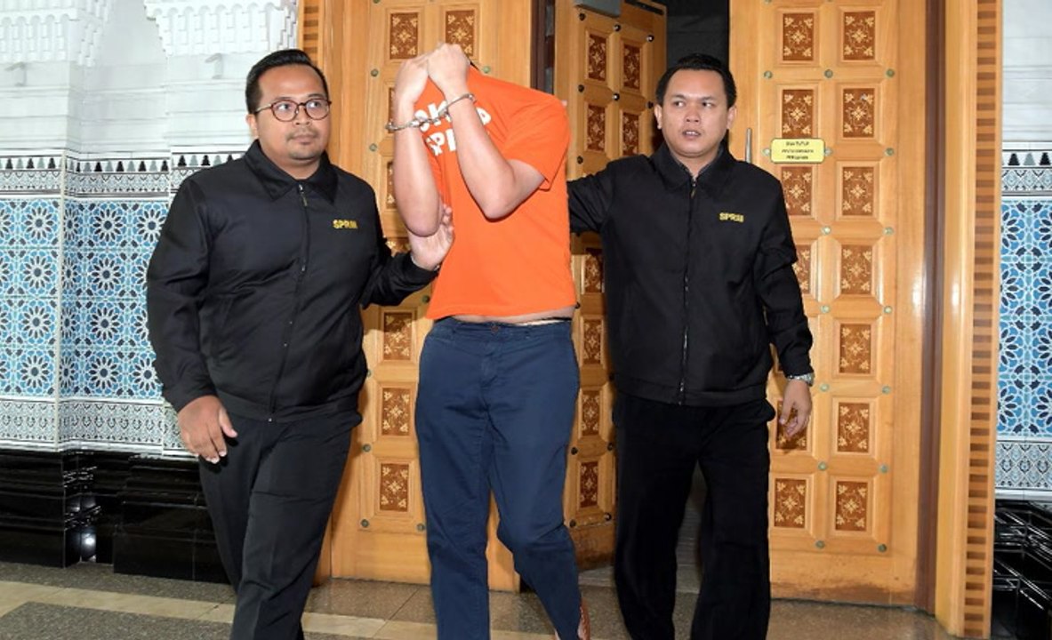 Najib’s former aide remanded in 1MDB probe
