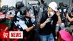 Protesters scuffle ahead of Hong Kong handover anniversary ceremony