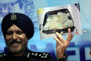 Police say there is no ‘Umno’ word on the money