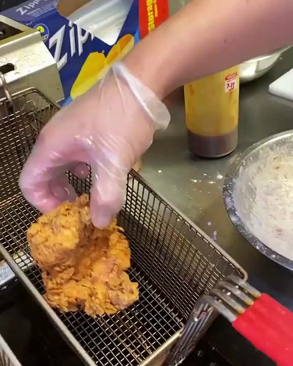 SPICY PARMESAN GARLIC Fried Chicken Sandwich!  Famous Fried Chicken sandwich in spicy Parmesan garlic sauce with pickles, slaw and Parmesan cheese!