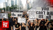 'Sea of black' Hong Kong protesters demand leader step down