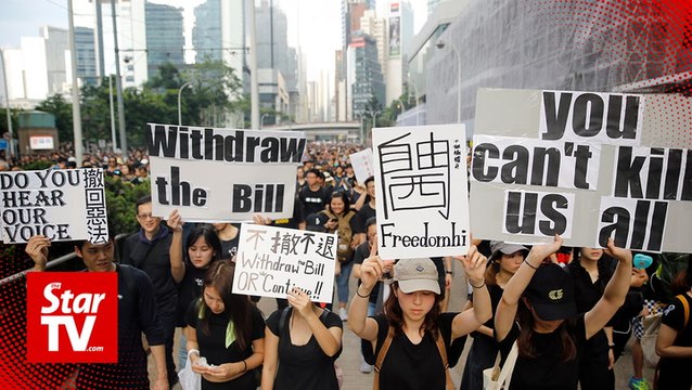 'Sea of black' Hong Kong protesters demand leader step down