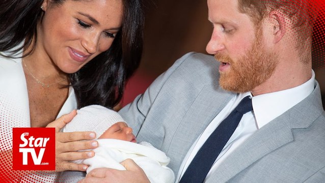 Prince Harry and Meghan introduce their son to the world