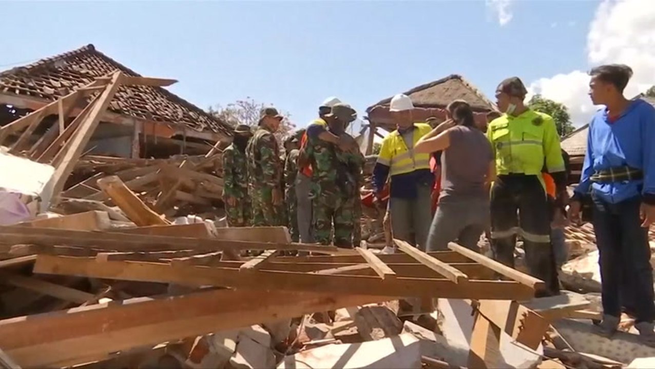 Survivor found beneath convenience store flattened by Lombok quake