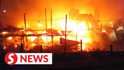 Wooden house razed near Kuching, family of 10 escapes unharmed