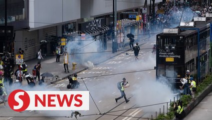 Tải video: Police fire tear gas in Hong Kong protests condemning proposed security legislation