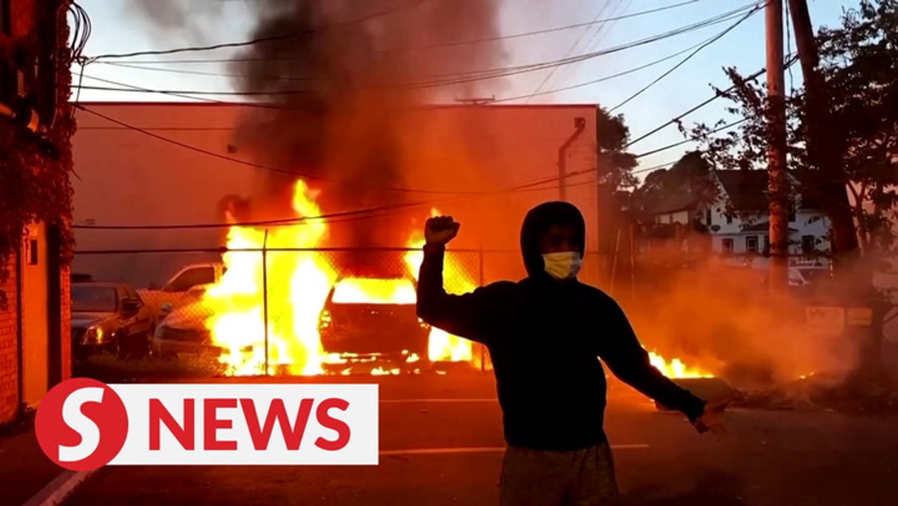 George Floyd murder: Protesters loot and set fire to Minneapolis store