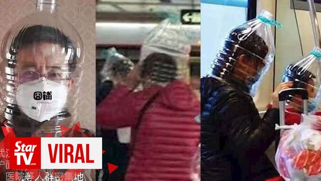 Travellers cover heads with plastic bottles during coronavirus outbreak
