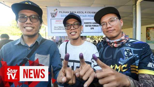 Triplets cause a 'stir' at Kimanis polling station
